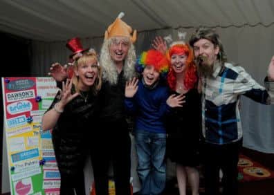 22 year old Liam Buckley from Worksop, who has incurable Bowel Cancer, is pictured with family & Friends, at North Notts Arena, Worksop.
A Fundraiser for West Park Hospital, with many of those present Wearing Fancy Hats & Wigs, for Charity.
NWGU 22-11-14 Hats, Liam Buckley & family, L/R Janet & Darren Buckley, Liams Mum & dad, Younger brother Adam (14), Sister Emma, and Liam Buckley