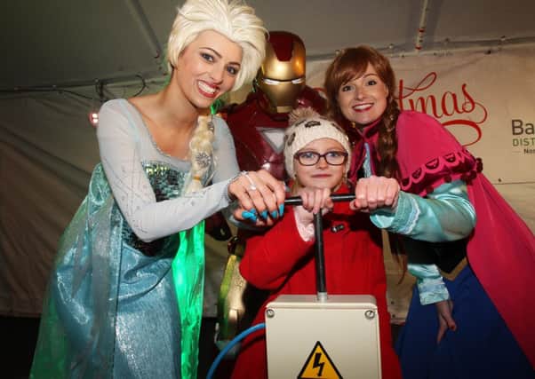 Worksop Christmas lights switch-on 2014. Ellie Mai switced the lights on with the help from Frozen characters Elsa and Anna and Iron Man.