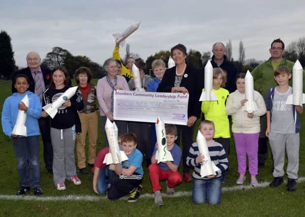 Half term activites at Greenlands Park, North Anston, pictured coun Judy Dalton presenting a cheque towards the cost of the event