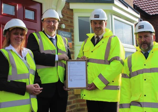 Jodi Wray and Trevor Durant from West Lindsey District Council with Chestnut Homes Rob Cucksey and Mick Burridge