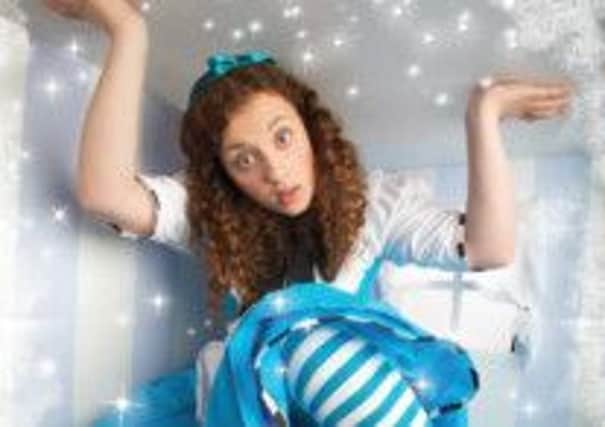 Naomi French plays Alice in Alice's Adventures in a Winter Wonderland at the Lincoln Performing Arts Centre