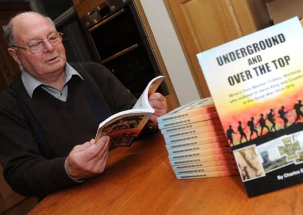 Worksop author Charles Emsen with copies of his new book, Underground and Over the Top