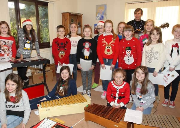 The school choir from Morton Trentside Primary sang Christmas songs at George Henderson Lodge St Barnabas Hospice in Morton.
