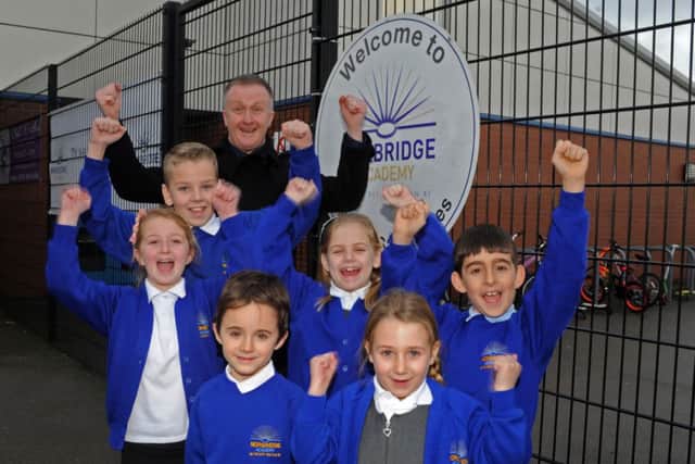 Headteacher George Huthart and pupils from Norbridge Academy, Worksop celebrate on achieving an outstanding Ofsted report. Picture: Andrew Roe
