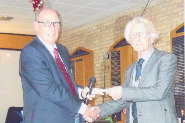 Ron Varney, last years Captain of the Gainsborough Golf Club is pictured presenting a cheque for £4,017 to Steve Underwood, a volunteer for the Lincolnshire and Nottinghamshire Air Ambulance.