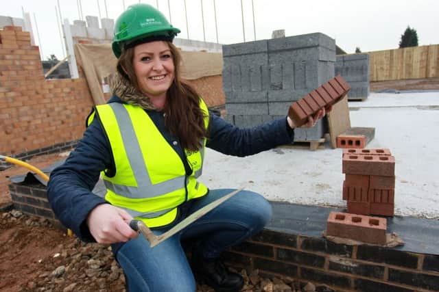 A1 Housing Tenant Shelley McVay layed one of the first bricks at A1 Housing new development at Smith Square in Harworth.