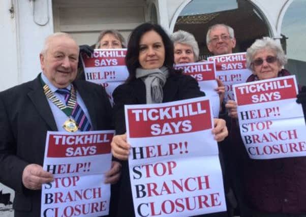 Caroline Flint, local town councillors and residents voice their concern about the loss of Tickhills last bank.