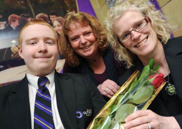 Guardian Rose presentation to Tanya Parkin (right) Year 10 Learning Manager at Outwood Academy Valley by Year 10 pupil Ben Nunwick 14 who suffers from ME. Pictured here with his mother, Clare Nunwick.