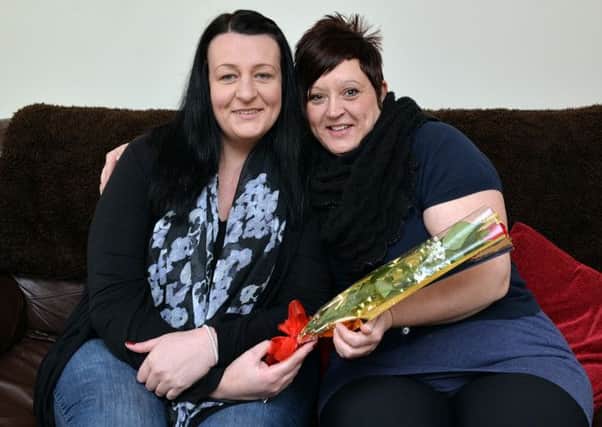 Guardian Rose for Lisa Hellewell for being a great friend, Lisa is pictured right recieving her rose from Melanie Heslop