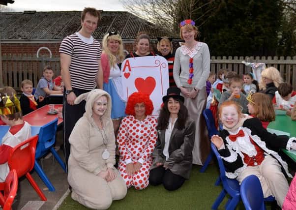 World Book Day celebrations at Willoughton Primary School, the whole school dressed as characters from Alice In Wonderland