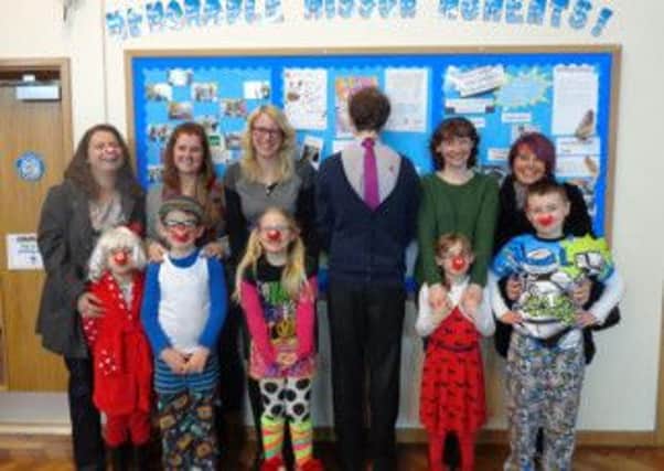 Pupils at Mission Primary School invited their mums into school on Comic Relief day for a special Mothers Day assembly and lunch