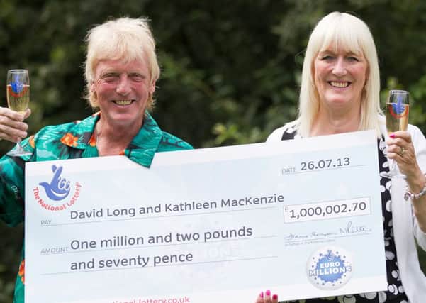 rossparry.co.uk / Tom Maddick
RPYLotto
Pictured David Long and Kathleen Mackenzie won £1,000,002.70 on the Euro Millions on Friday. David had thrown the winning ticket away before taking it from the in to cash in the £2 he believed he had won.