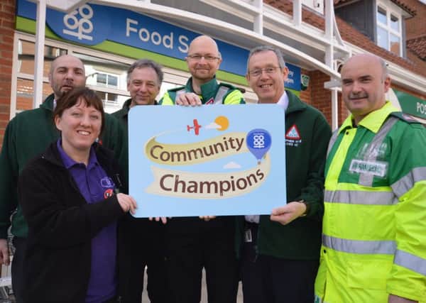 LIVES First Responder Gary Bolton, Lincolnshire Co-ops Hayley Baggott, LIVES First Responders Andy Kerry and Carl Belcher, LIVES Fundraising Manager Stephen Hyde and LIVES Medic Tony Tempest.