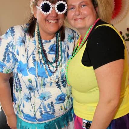 Residents and staff at Waterside Grange Care Home dressed up to take part in Dignity Day as part of St George's Day celebrations. Pictured are Rita Bel and Clare Smithson.