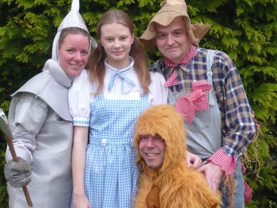 Julie Ballin, Ellie Ashmore, Richard Gilson and Gavin Ward in Dronfield Musical Theatre Group's production of The Wizard of Oz.