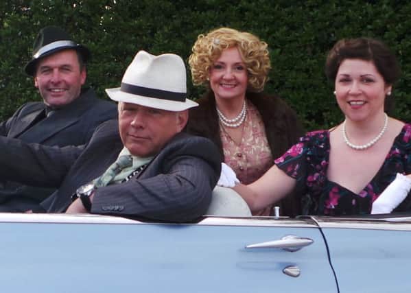 David Hopkinson, Rob Hall, Joan Hopkinson and Debi Alvey, left to right, in Peak Performance's production of Guys and Dolls.