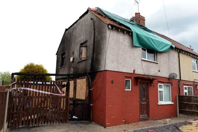 A house damaged by fire on Hardwick Road West, Worksop