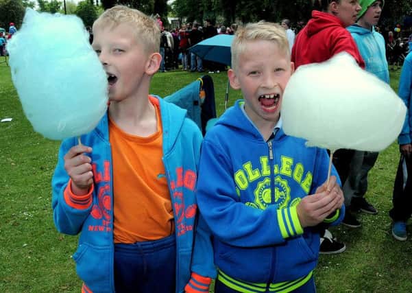 Worksop Canch played host to a Childrens Day Celebration, with a number of busy activities,.Money raised is for Bassetlaw Food Bank NWGU 6-6-15 Children, Twins, Alexander & Karol Bokszanowska with Candy Floss (2)