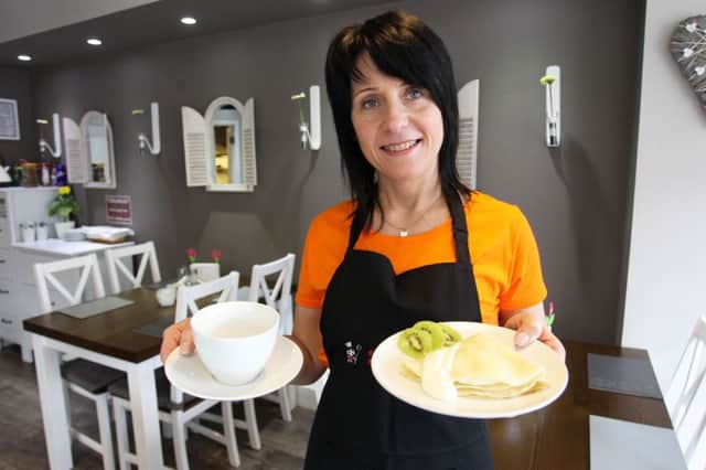 Guardian freebie offer this week of a pancake with white cheese and cream with a drink at Sister's Diner on Gateford Road. Pictured is owner Maggie Kopanska with the offer.