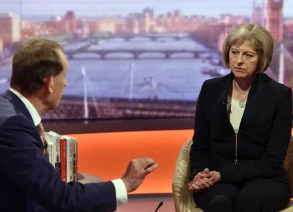 Home Secretary Theresa May (right) speaking with Andrew Marr while appearing on BBC One's The Andrew Marr Show. Photo: PRESS ASSOCIATION