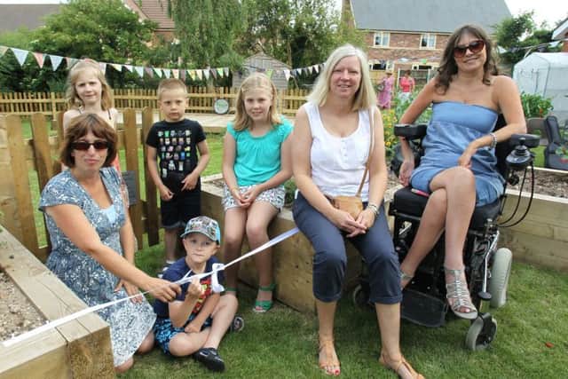 The opening of a new gardne at Beckingham Primary School. Fiona Martin, the Chair of the PTFA opens the garden.