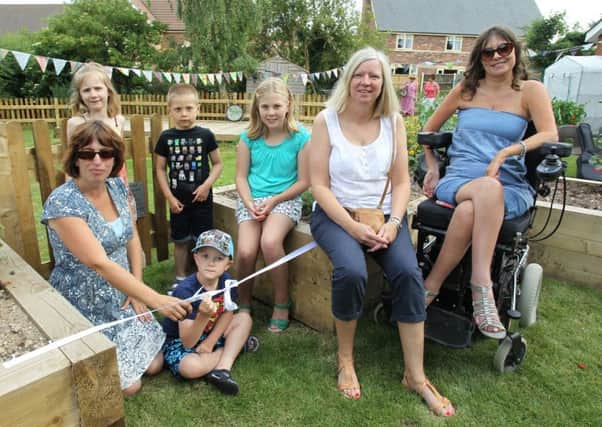 The opening of a new gardne at Beckingham Primary School. Fiona Martin, the Chair of the PTFA opens the garden.