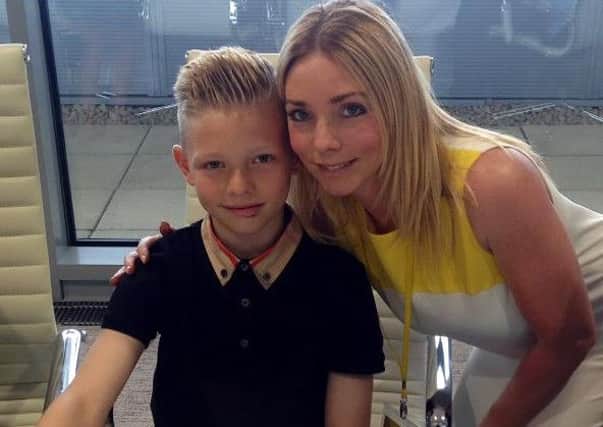 Kian Breckin and mother Leanne Breckin as he signs for Manchester City