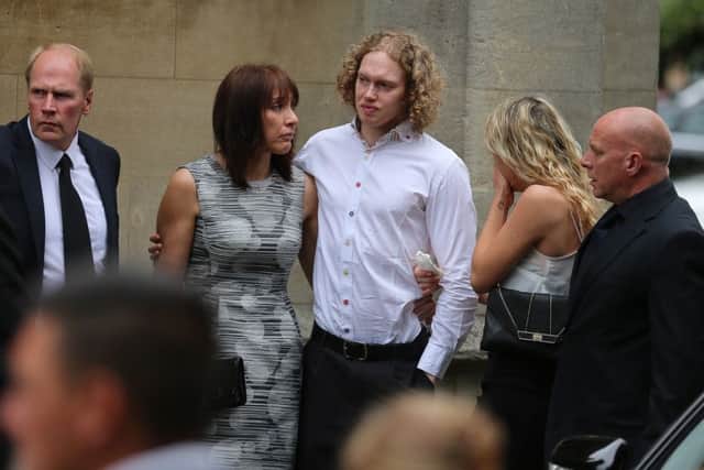 Fiance Liam Moore and Carly's close family arrive at the Church. The funeral of Carly Lovett, 24, at All Saints' Parish Church, Gainsborough today July 17 2015. Carly was one of 38 people killed in the Tunisian terrorist attack on June 26th at the coastal resort of Sousse. The 24-year-old was enjoying a holiday with fiance of six months Liam Moore who survived the attack.
Tom Maddick / Rossparry.co.uk
