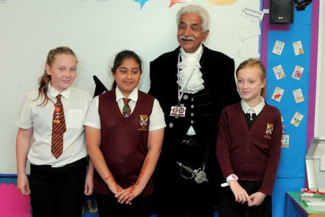Dr Jas Bilkhu, High Sherriff of Notts, with pupils from Worksop Priory School who have been taking part in the Take Five scheme