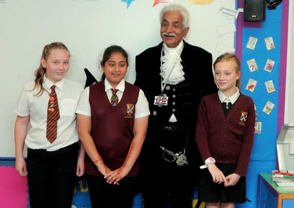 Dr Jas Bilkhu, High Sherriff of Notts, with pupils from Worksop Priory School who have been taking part in the Take Five scheme