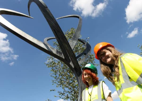 A new sculpture has been unveiled at Worksop bus station which has been designed by students from North Notts College. Students Melaine Walker and Kimberley Moore are pictured with the sculpture.
