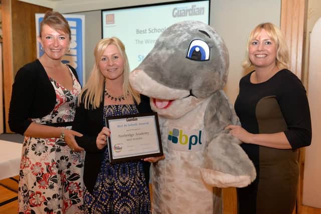 The Worksop Guardian Best in Schools awards, special recognition in the Best School of the Year award Norbridge Academy receiving her award from Derek the Dolphin representing sponsor BPL Leisure with compere Sally Richardson