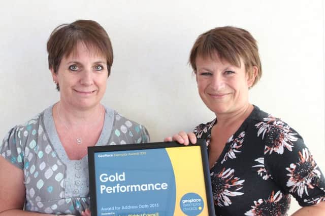 Corporate systems development manager, Jeannette Anderson and Local Land and Property Gazeteer officer, Vicki Stevens with the award.