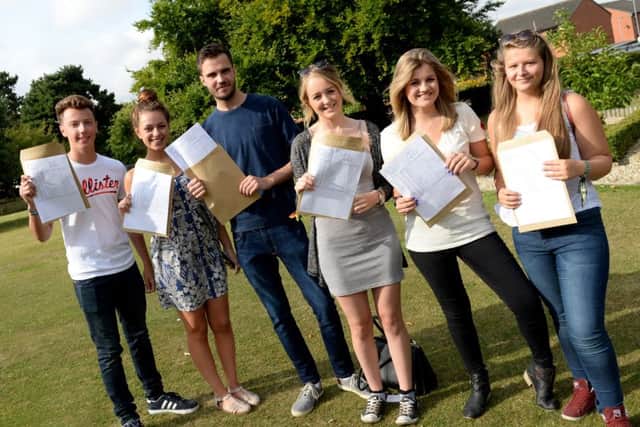 Students at Queen Elizabeth's High School with their A-level results