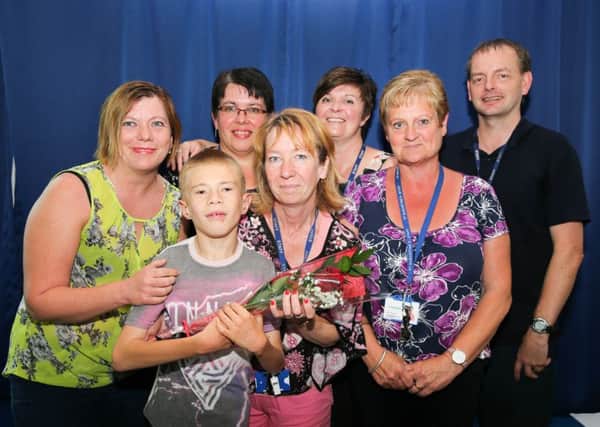 Guardian Rose     St Augustine's Primary School      L>R Mrs Parsons, Mrs Houghton, Mrs Blades, Mr Kelly FRONT L>R James Parsons age 11, Mel Sanderson,  Tracey Howard