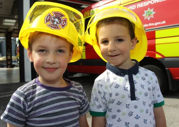 Family fun day at Worksop Fire Station. Pictured are Aiden Watkinson, three, and Charlie Anderson, three.