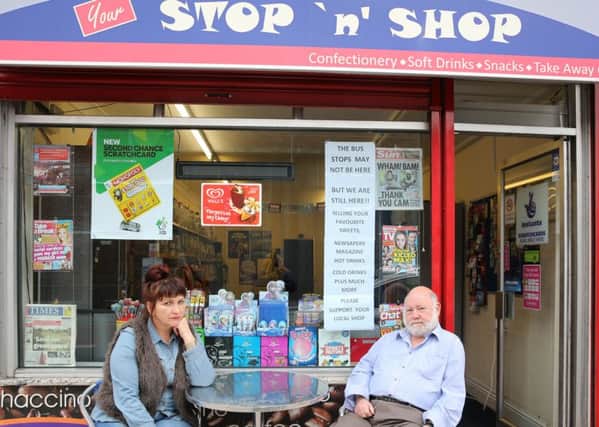NWGU Bus Stops Hardy Street  The owners of the Stop 'n' Shop are concerned for the future of their business after the bus stops on Hardy Street have been removed because of the new bus station.  Marina and Ray outside the shop