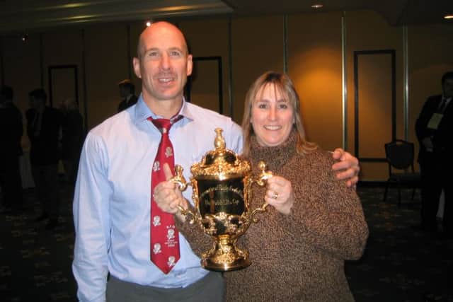 Phil Pask with wife Janice and the William Webb Ellis trophy
