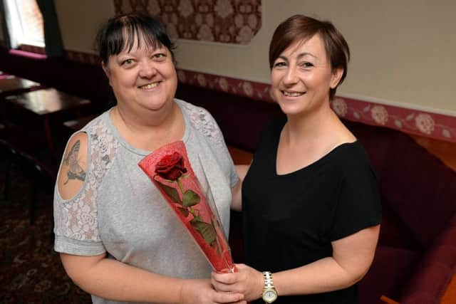 Guardian Rose presentation to Jacqueline Wilkinson, pictured left receiving her rose from Karen Waite
