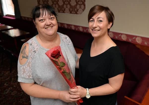 Guardian Rose presentation to Jacqueline Wilkinson, pictured left receiving her rose from Karen Waite