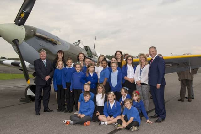 Veterans day at Gamston Airport, children and staff of St Augustine's Primary School pictured with MP John Mann and Coun Glynn Gilfoyle