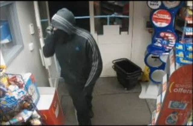 Screenshot of CCTV footage released by Nottinghamshire Police of a robbery in the Eastwood area.