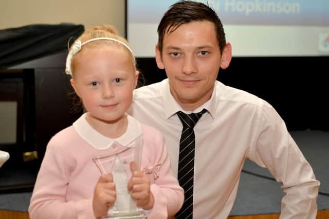 Worksop Guardian Community Awards 2015, pictured is winner of the Most Improved Student award Abbi Hopkinson with Anthony Rea of sponsor Domino's