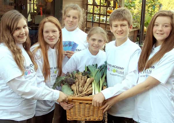 Tuxford Academy Gardeners
Pupils at Tuxford Academy pictured with the Garden Vouchers given to the School in exchange for produce grown for the school kitchen.
Pictured from the left are; Lydia Battersby, Lucy Marshall, Ashley Hope, Amelia Fletcher, Claude Wallace and  Kathryn Daly