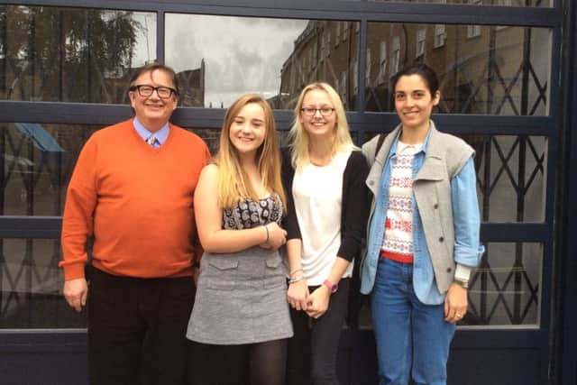 Queen Elizabeth's High School design students Laura Wilson and Amy Mackenzie with Sebastian Conran and his assistant