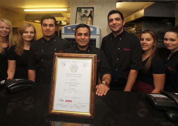 Staff at Florentino's, Market Street, Gainsborough with their award for best independent deilvery store at the Pizza, Pasta & Italian Food Industry Awards. Picture: Andrew Roe