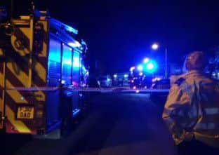 Police cordoned off School Road while firefighters tackled the blaze