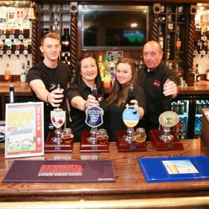 The Unicorn, have attained a placing in CAMRA's Good Beer Guide 2016   L>R Michael Lantieri, John Darb, Michelle Stowell-Ng Licencee Helen Packard,