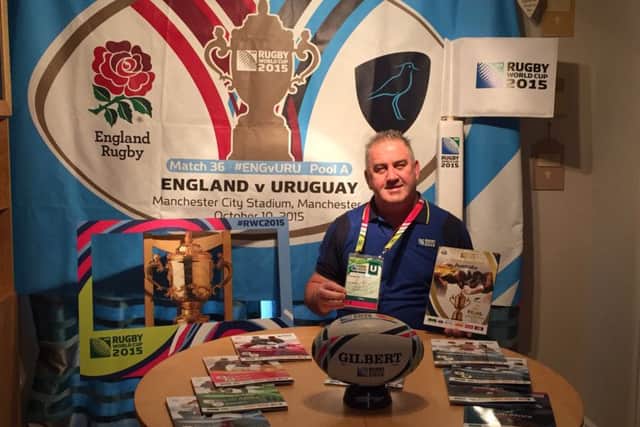 Mark 'Scotty' Walker with his memorabilia haul from the 2015 Rugby World Cup
