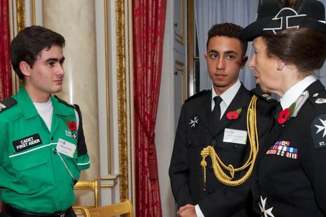 Cameron Hoyle, 16 (left) is pictured with Princess Anne and cadet of the year Anton Cornibert
